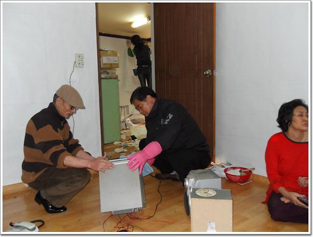 동그라미 봉사대 도배봉사 사진