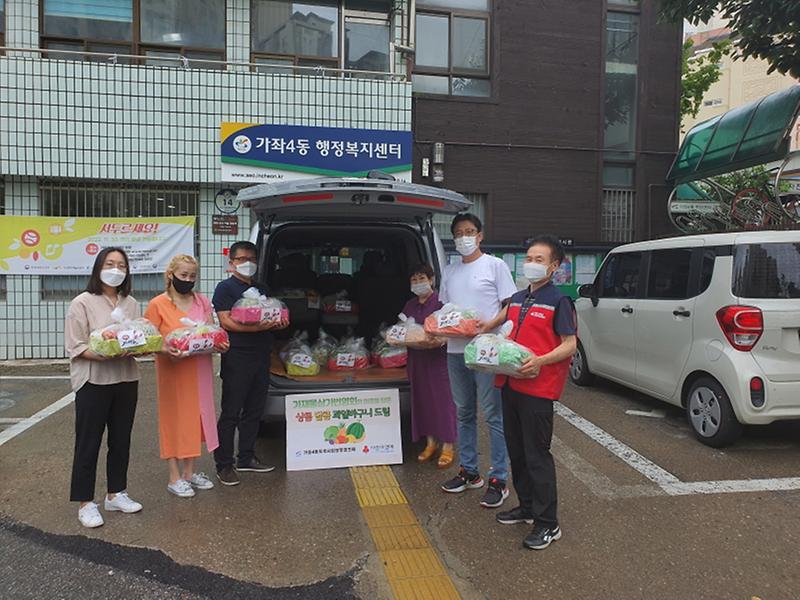 4가재울상가번영회,_가좌4동에_‘과일바구니’_후원_.jpg 이미지
